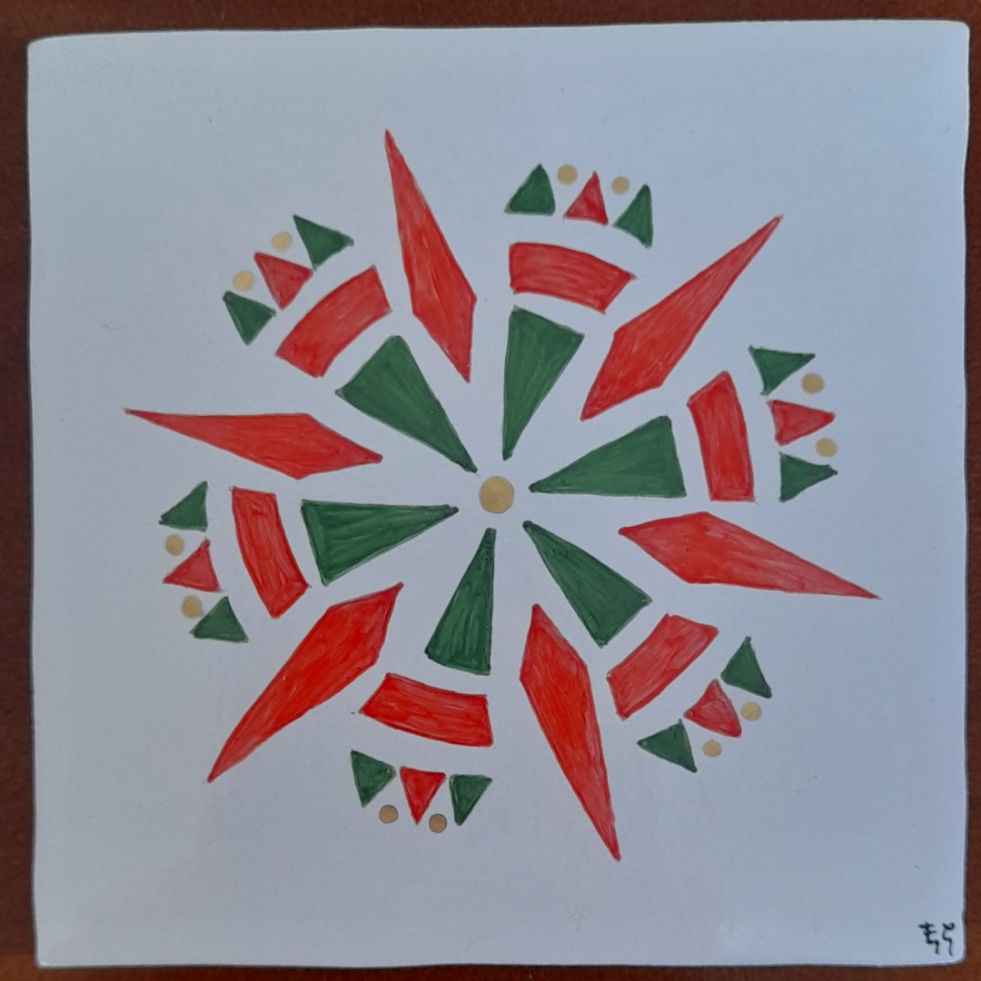 Photo d'un des dessous de verre de Noël "Etoiles de Noël", carreau de céramique peint à la main