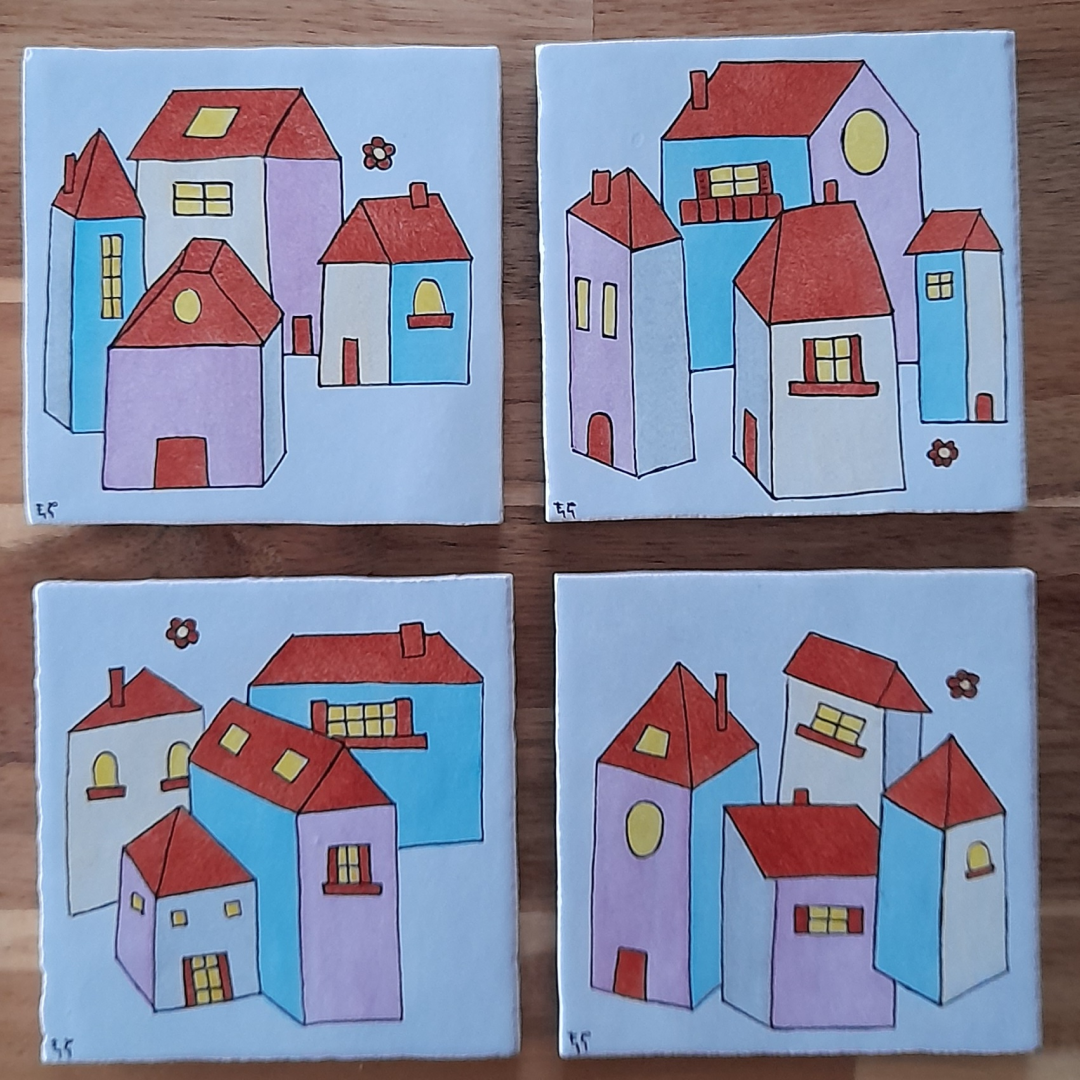 4 maisons aux toits rouges